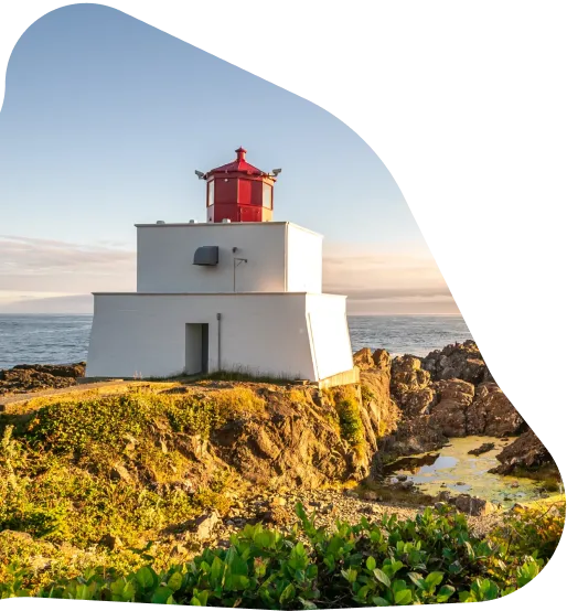 A lighthouse on a rocky outcrop